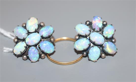 A pair of white metal and white opal cluster floral earrings and a small 22 ct gold band.